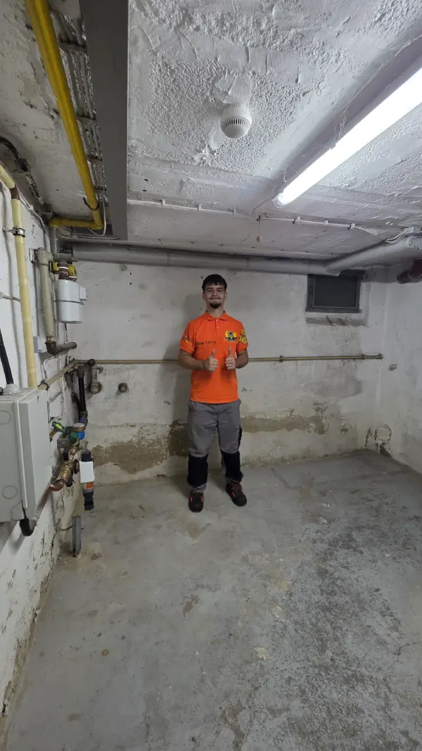 Nachher: Komplett leerer Abstellraum nach der Kellerentrümpelung in Aachen